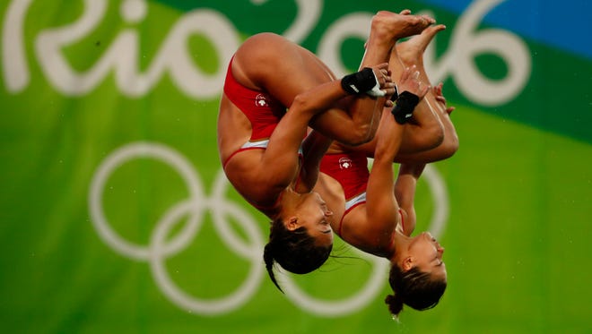 Meaghan Benfeito and Roseline Filion during the women's 10-meter platform synchronized diving final.