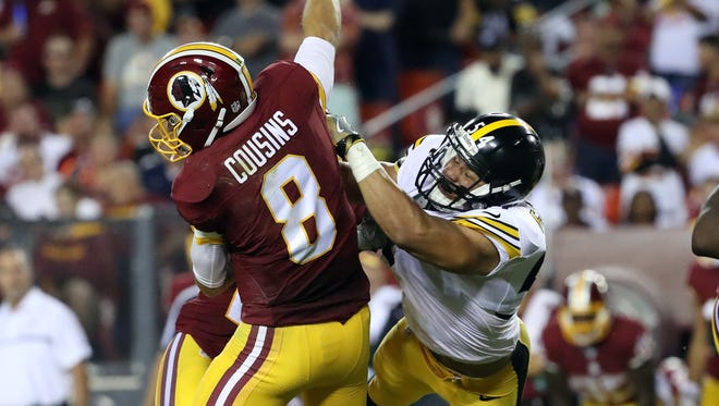 Steelers linebacker L.J. Fort (54) clobbers Redskins quarterback Kirk Cousins (8) on a second-half pass attempt.