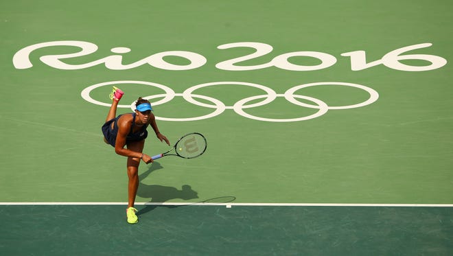 Madison Keys of the United States serves during her women's third-round singles match against Carla Suarez Navarro of Spain at Olympic Tennis Centre in the Rio 2016 Summer Olympic Games.