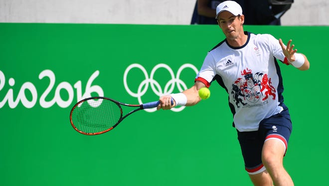 Andy Murray of Great Britain returns the ball to Juan Monaco of Argentina during a second-round tennis match at Olympic Tennis Centre in the Rio 2016 Summer Olympic Games.