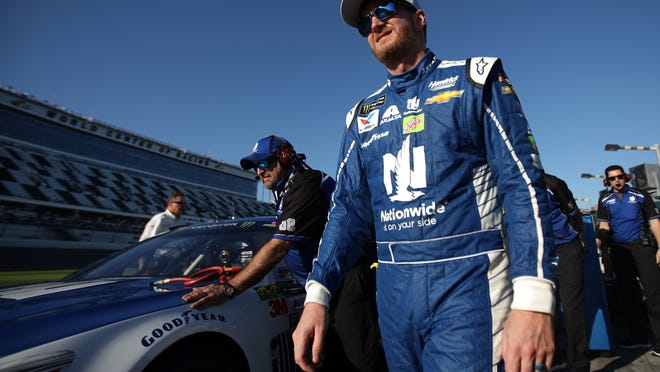 DAYTONA BEACH, FL - FEBRUARY 19:  Dale Earnhardt Jr., driver of the #88 Nationwide Chevrolet, stands on the grid during qualifying for the Monster Energy NASCAR Cup Series 59th Annual DAYTONA 500 at Daytona International Speedway on February 19, 2017 in Daytona Beach, Florida.  (Photo by Chris Graythen/Getty Images) ORG XMIT: 700003196 ORIG FILE ID: 642959336