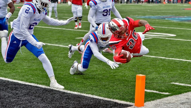 Western Kentucky running back Anthony Wales dives for a touchdown against Louisiana Tech.
