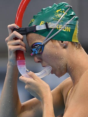 Emma McKeon of Australia uses a snorkel at the practice pool.