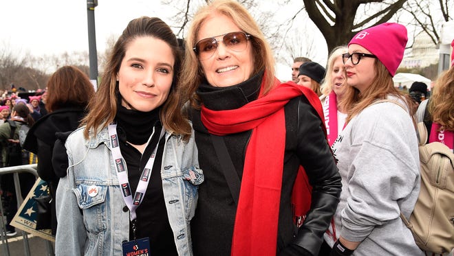 Sophia Bush, left, and Gloria Steinem attend the rally at the Women's March on Washington.