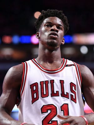 Jimmy Butler reacts during the first half against the Brooklyn Nets.
