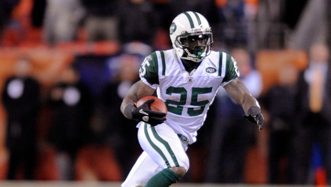 In this Nov. 17, 2011, file photo, New York Jets running back Joe McKnight (25) runs during an NFL football game against the Denver Broncos.