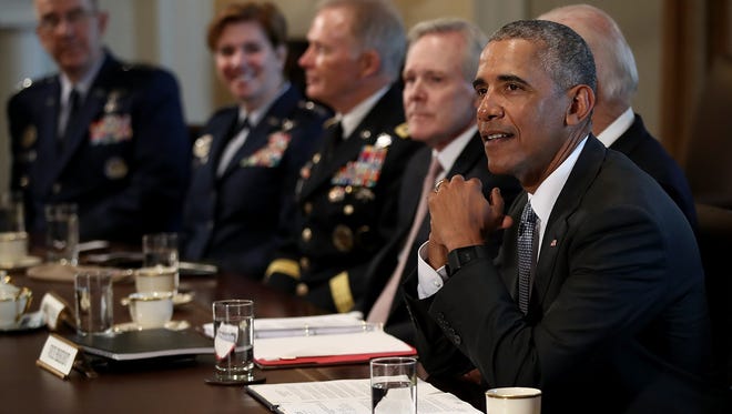 Obama and Biden meet with Combatant Commanders and members of the Joint Chiefs of Staff in the Cabinet Room of the White House on Jan. 4, 2017.