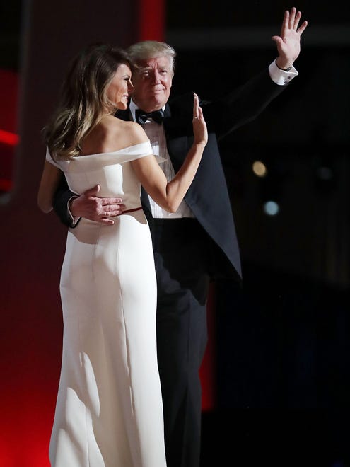 U.S. President Donald Trump dances with first lady Melania Trump during the inaugural Liberty Ball at the Washington Convention Center in Washington.