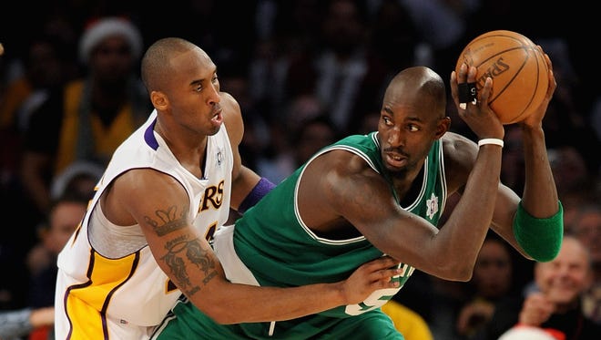 Kevin Garnett looks for an open pass over Kobe Bryant during the game on December 25, 2008 at Staples Center in Los Angeles, California.
