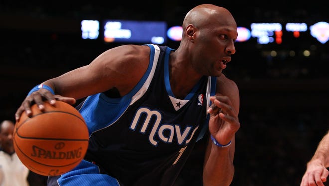 Dallas Mavericks power forward Lamar Odom dribbles to the basket against the New York Knicks at Madison Square Garden. (Feb 2012)