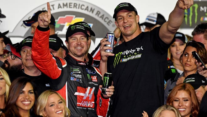 Kurt Busch celebrates with New England Patriots star Rob Gronkowski after winning the 2017 Daytona 500, the first race of the rebranded Monster Energy NASCAR Cup Series.