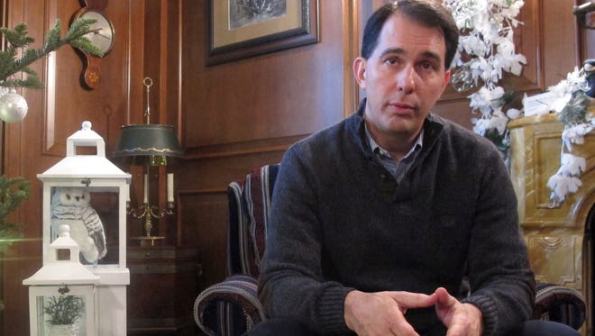 Wisconsin Gov. Scott Walker speaks during an interview with The Associated Press on Wednesday in the governor's mansion in Maple Bluff.