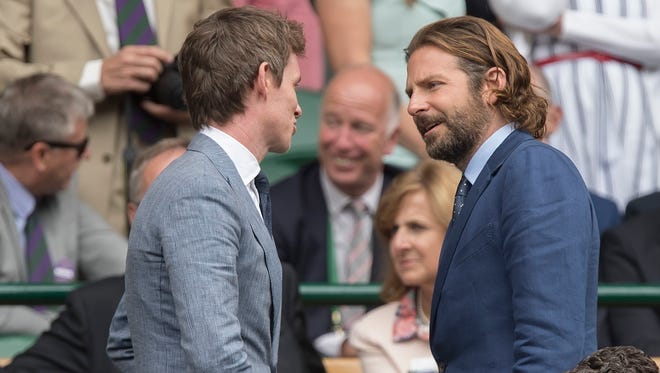 Eddie Redmayne and Bradley Cooper in attendance for the men's final between Marin Cilic and Roger Federer on day thirteen.