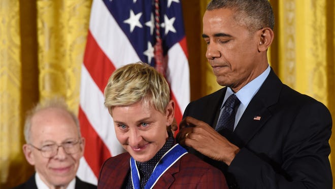Obama presents actress and comedian Ellen DeGeneres with the Presidential Medal of Freedom, the nation's highest civilian honor, during a ceremony honoring 21 recipients in the East Room of the White House on Nov. 22, 2016.
