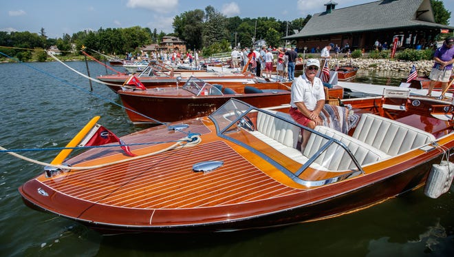 Gary Rechcygl of Sussex displays his 1956 Chris Craft during the 13th Annual Antique & Classic Boat Show at Pewaukee's Lakefront Park on Saturday, August 19, 2017. The event features vintage boats, a classic car show, vintage bicycles, live music, food and much more.