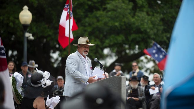 Tommy Rhodes speaks during a Confederate Memorial Day service outside the Alabama Capitol on Monday, April 24, 2017, in Montgomery, Ala.