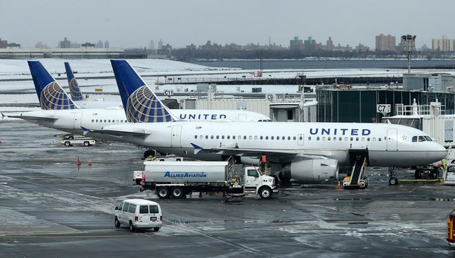 United Airlines jets sit on the tarmac March 15, 2017, at LaGuardia Airport in New York.