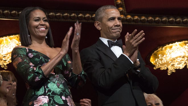 The Obamas attend the Kennedy Center Honors on Dec. 4, 2016, in Washington.