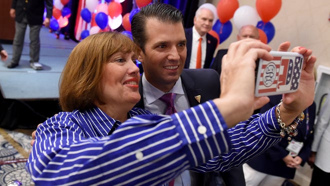 Lynne Ryan, a Pennsylvania delegate from New Castle, takes a selfie with Donald Trump Jr. after his speech at the Pennsylvania Republican delegate breakfast in the Westlake, Ohio, on July 19, 2016.
