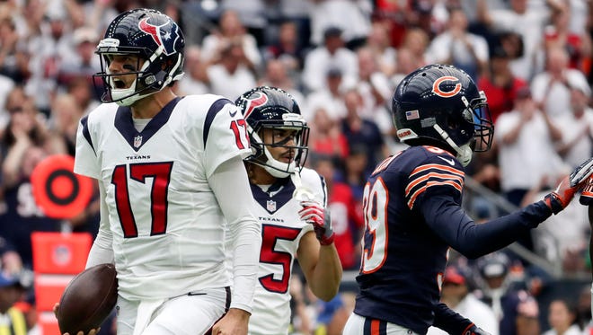 Houston Texans quarterback Brock Osweiler (17) reacts during the first quarter against the Chicago Bears at NRG Stadium.