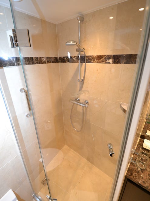 The tile-lined shower of a Panorama Suite.