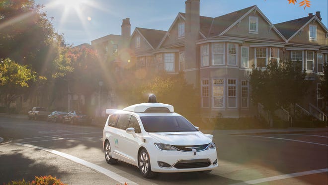 Google-run Waymo unveiled its new self-driving Chrysler Pacifica minivans at the North American Auto Show Sunday.