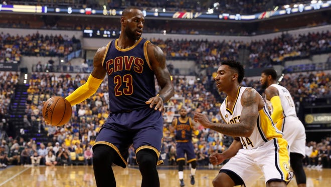 Cleveland Cavaliers forward LeBron James (23) is guarded by Indiana Pacers guard Jeff Teague (44) in game four of the first round of the 2017 NBA Playoffs at Bankers Life Fieldhouse.