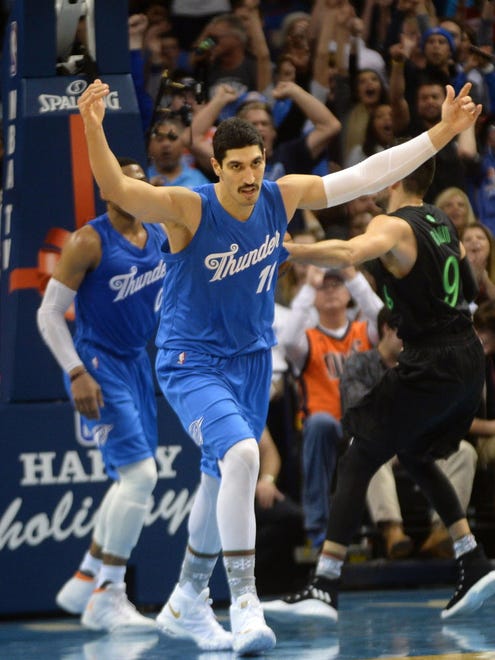Thunder center Enes Kanter (11) reacts after a play against the Timberwolves.