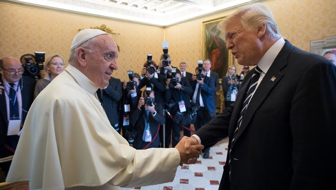 Pope Francis meets with President Trump on the occasion of their private audience, at the Vatican on May 24, 2017.  Trump met Pope Francis at the Vatican in a keenly-anticipated first face-to-face encounter between two world leaders who have clashed repeatedly on several issues.