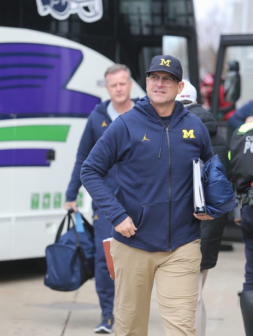Michigan head coach Jim Harbaugh arrives for the game against Ohio State on Saturday, November 26, 2016 at Ohio Stadium in Columbus.