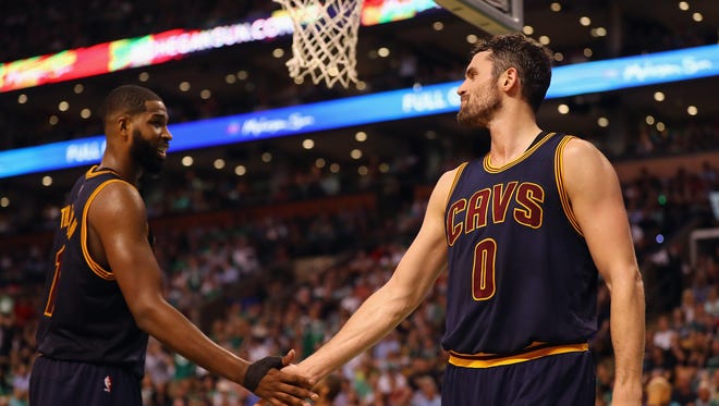 Kevin Love reacts with Tristan Thompson of the Cleveland Cavaliers in the second half of Game 1.
