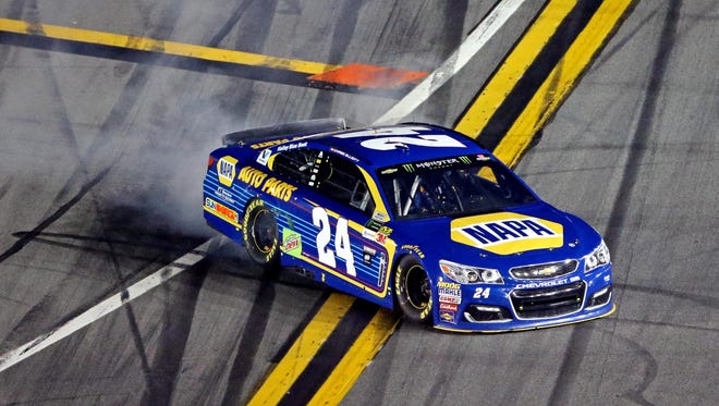 DUEL 1: Chase Elliott does a burnout after winning his duel. Elliott already had secured the pole for the 59th running of the Daytona 500.
