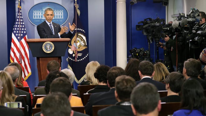 Obama answers questions during his year-end news conference in the Brady Press Briefing Room on Dec. 16, 2016.
