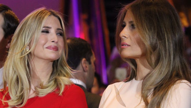 Ivanka Trump looks over at Melania Trump during Donald Trump's speech to a crowd of supporters after winning the New York primary on April 19, 2016.