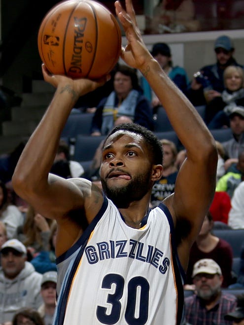 Memphis Grizzlies Troy Daniels takes a three-point shot during the game against the Cleveland Cavaliers.