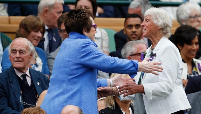 Tennis legend Billie Jean King greets former Wimbledon champion Ann Jones before the start of the Women's Singles final match on day twelve.