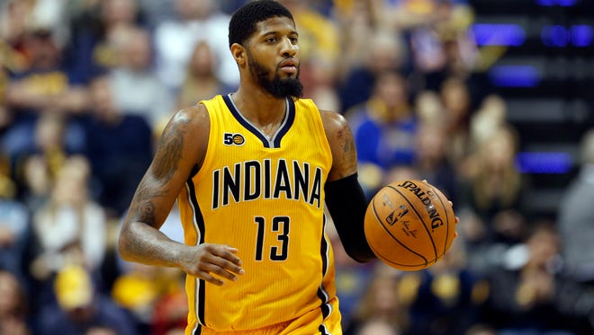 Indiana Pacers forward Paul George (13) says he wants to stay with the Pacers.