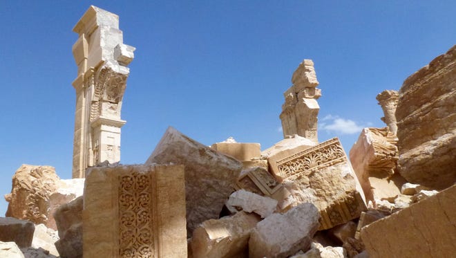 A general view taken on March 27, 2016 shows part of the remains of the Arc de Triomph monument that was destroyed by Islamic State militants in October 2015 in the ancient Syrian city of Palmyra.