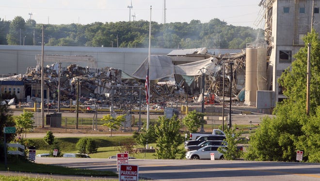 The destruction left after a May 31 explosion at the corn mill plant at Didion Milling greets drivers heading north on Highway 146 by Cambria. Three workers died in the explosion. A fourth died in the hospital from injuries sustained in the explosion.