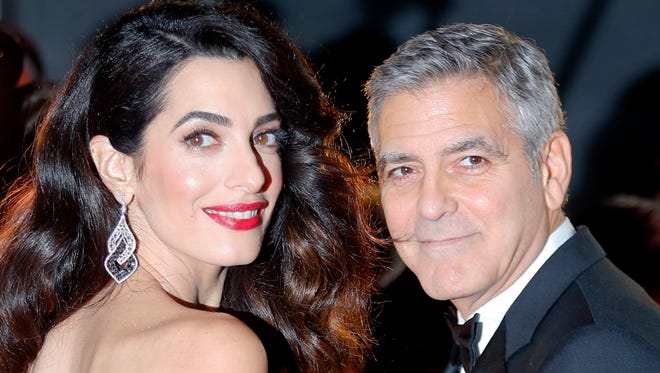 George and Amal Clooney on Feb. 24, 2017 at the Cesar Film Awards in Paris.