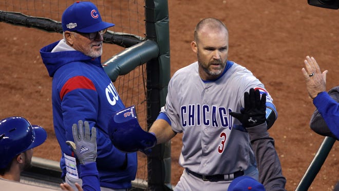 Game 4 in San Francisco: Cubs catcher David Ross celebrates after hitting a solo home run during the third inning.