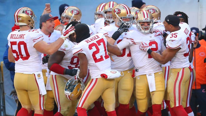 The 49ers celebrate a game-winning TD in 2015.