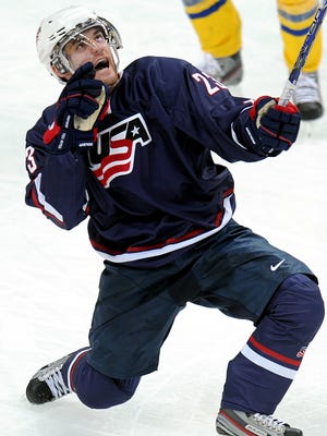Team USA's Rocco Grimaldi celebrates a goal during a game in the 2013 IIHF Ice Hockey U20 World Championship against Sweden in Ufa on Jan. 5, 2013.