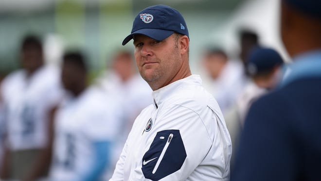 Titans general manager Jon Robinson watches his players during practice at St. Thomas Sports Park Thursday Aug. 11, 2016, in Nashville, Tenn.