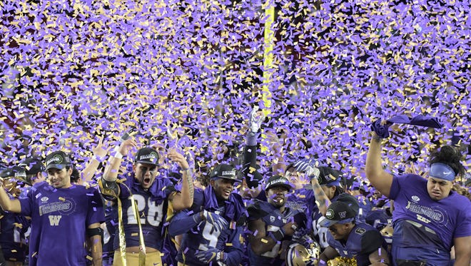 Amid the confetti, Washington celebrates its first conference title since 2000.