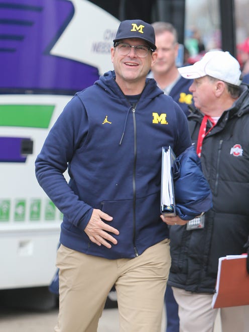 Michigan head coach Jim Harbaugh arrives for the game against Ohio State on Saturday, November 26, 2016 at Ohio Stadium in Columbus.