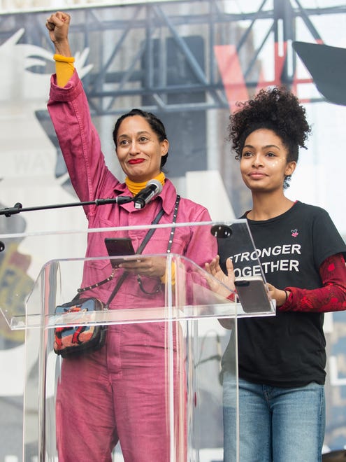 Tracee Ellis Ross, left, and Yara Shahidi attend the Los Angeles Women's March.