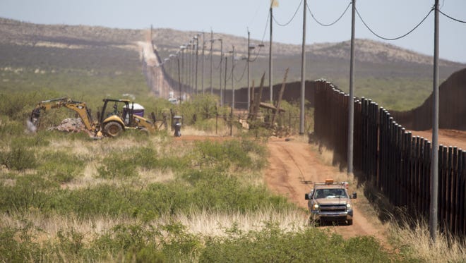 Honing in on the cost of President Donald Trump's "big, beautiful wall" is difficult, primarily because he has offered shifting estimates and conflicting details.