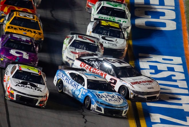 Ross Chastain (1) collides with Austin Cindric (2) as the drivers race to take the white flag for the final lap of the 2024 Daytona 500. The caution flag was waved seconds later and William Byron (24) was declared the leader and thus the winner of the race on Feb 19.