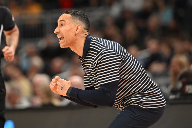 Mar 24, 2024; Indianapolis, IN, USA; Marquette Golden Eagles head coach Shaka Smart reacts during the first half against the Colorado Buffaloes at Gainbridge FieldHouse. Mandatory Credit: Robert Goddin-USA TODAY Sports
